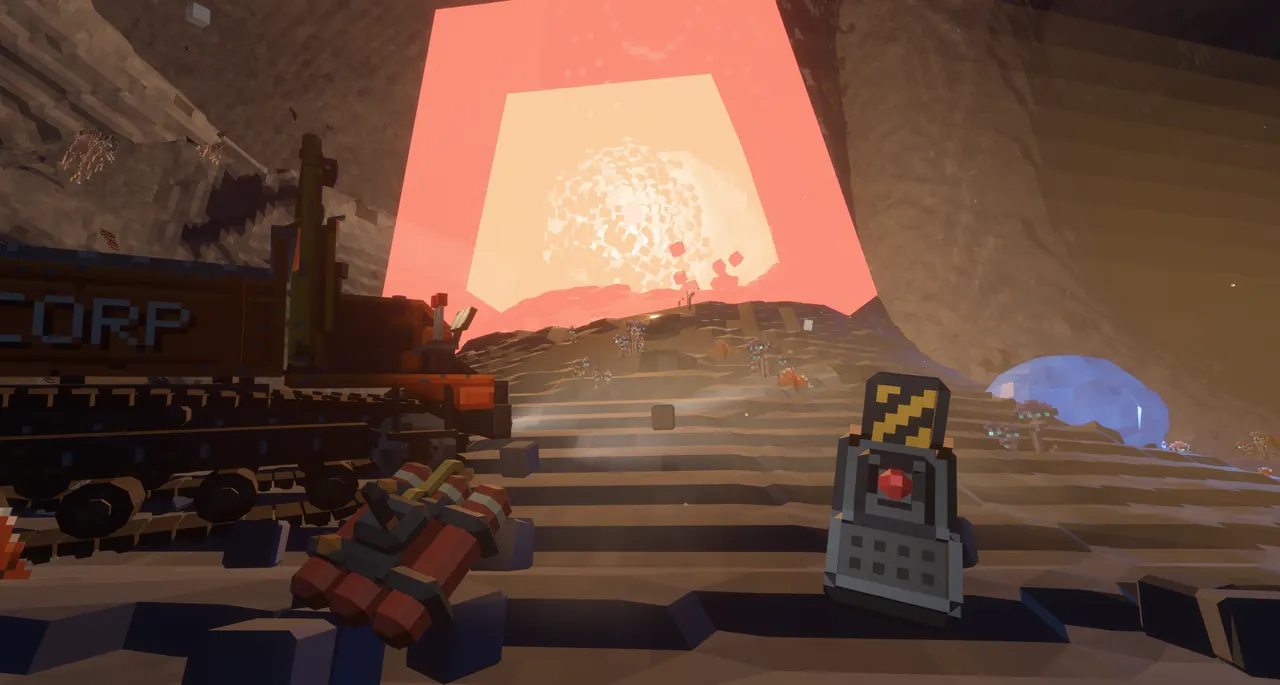 A glowing ore press and a tracked machine on a cage landing
